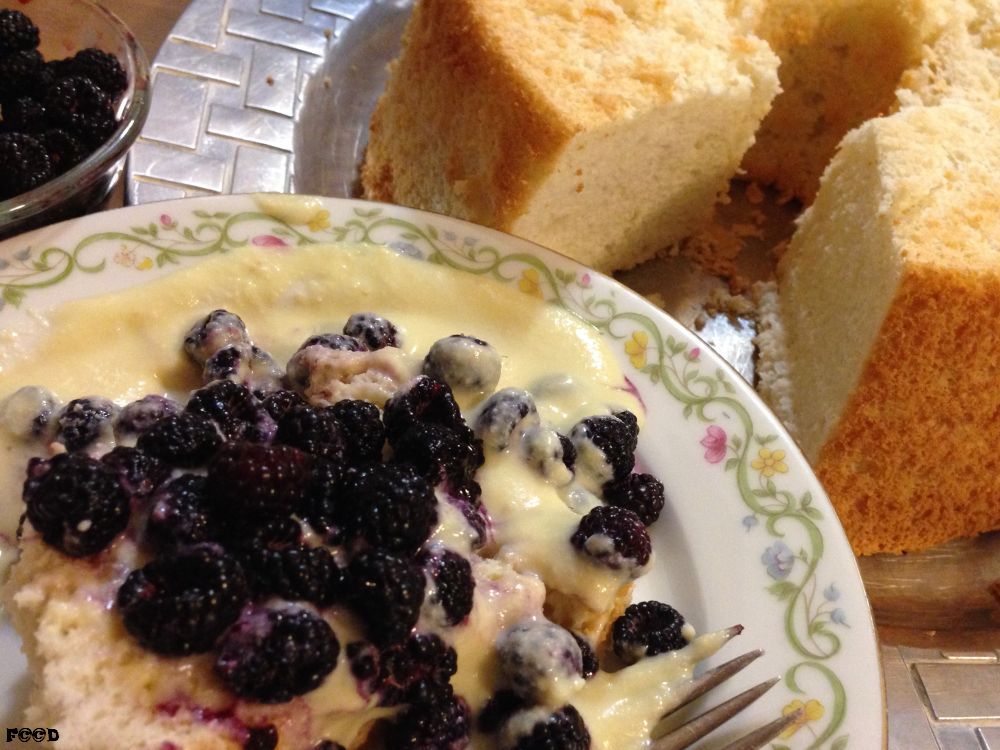 An Angel Food cake, hand picked berries, so delightful, and a custard cream sauce, which was very delightful, served in monstrously big portions to fit my appetite