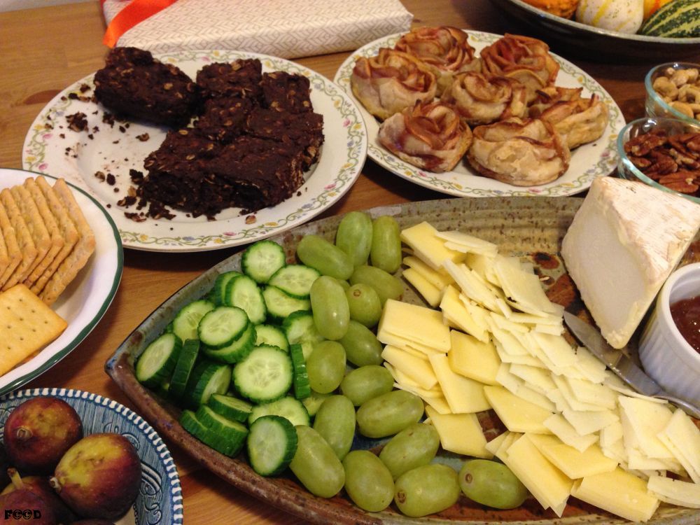 Box of candies, ornamental squash, do not ask me why, these things appear to be a necessity, brownies, apple crisps, nuts, cheese, grapes, apples, crackers, figs, cucumbers, a decadent feast, which in the end, I most of, so maybe hospitality does pay