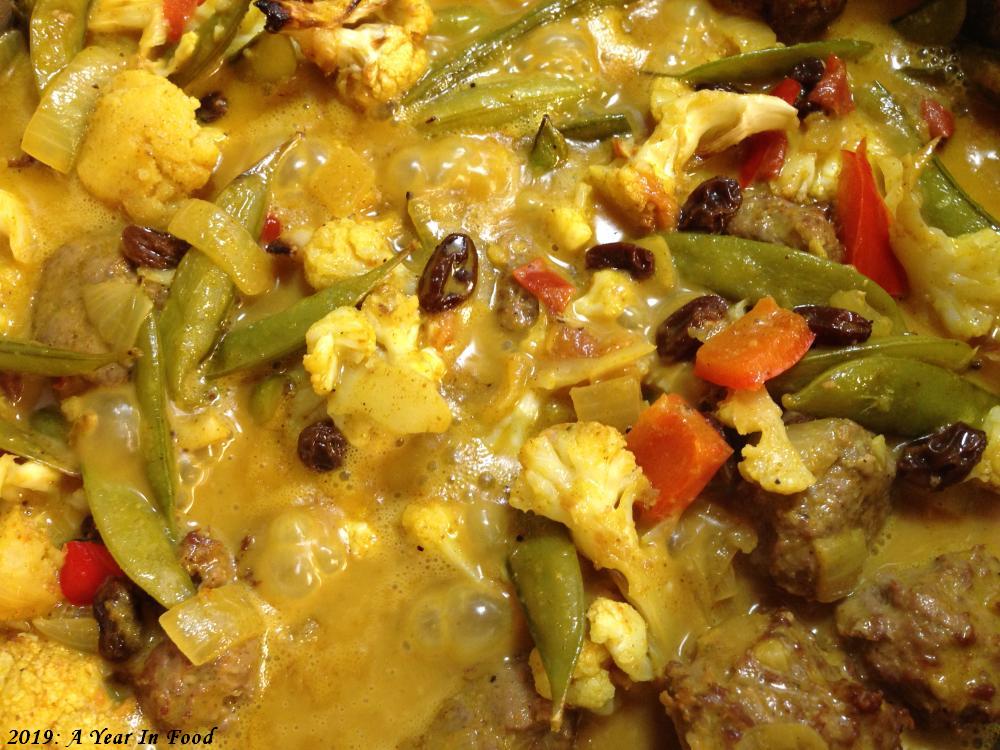 As good as any plate lunch curry, homemade lamb meatballs, green beans, which were not so good, onions, in a brown curry sauce with cauliflower, raisins, and peppers, full of flavour