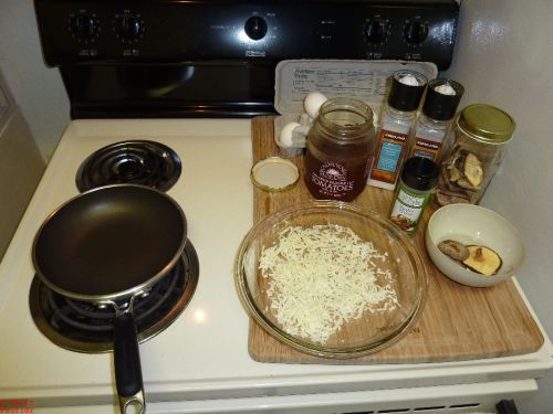 Stovetop filled with ingredients, pan for frying eggs, eggs in the background, salt, pepper, dried mushrooms in jars and bowls, sun dried tomatoes, it has been so long, I forgot all about eating this stuff