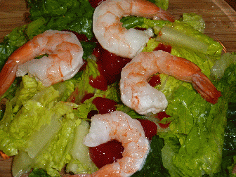 Lettuce, shrimp, cocktail sauce, not eating much shrimp these days, but its an easy dish, that Im going to assume is healthy