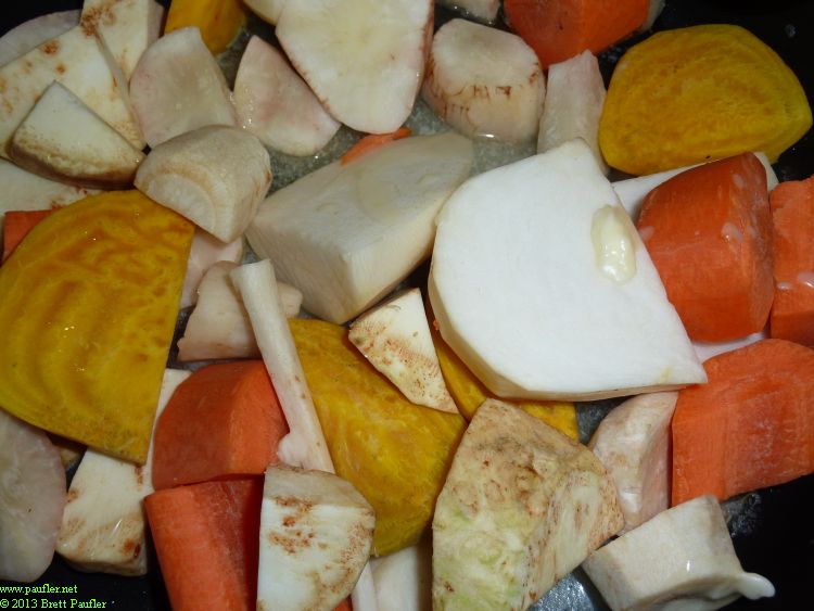 THe caption below pretty well sumarizes the items on this page, this is carrots, sweet potatoes, and the white things are turnips, cut up and placed ina  bowl, raw