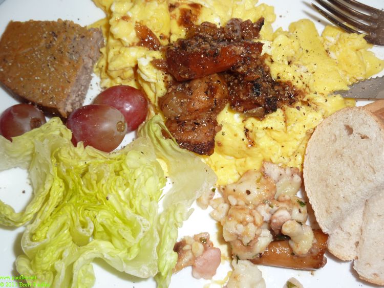 Stew over eggs for flavour, so like eggs with salsa, on the root stuff instead of salsa, more lettuce, must have bought a three pack of romaine from Trader Joes, bread, grapes, white stuff bottom center is spratzel or something like that, fried german noodles