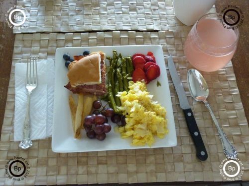 Top down image of the food, pink stuff in the glass if vitamin fortified lemonade from  mix, what do you know, there were asparagas spears on the plate, as well