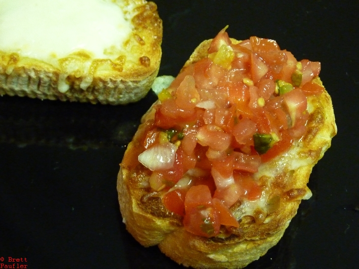 CloseUp of the toast with salsa on top looks really good, so strange how things change from image to image, truth is, i am getting pretty hungry, time for breakfast real soon