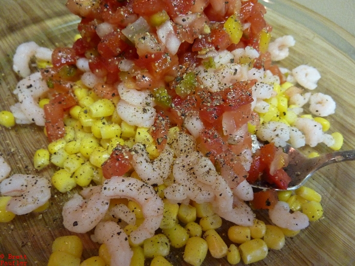  Shrimp, Corn, Salsa Salad, finished product, peppered heavily, i am thinking the pepper was important, added that something, lime juice sounds good as well, and a sprig of cilantro