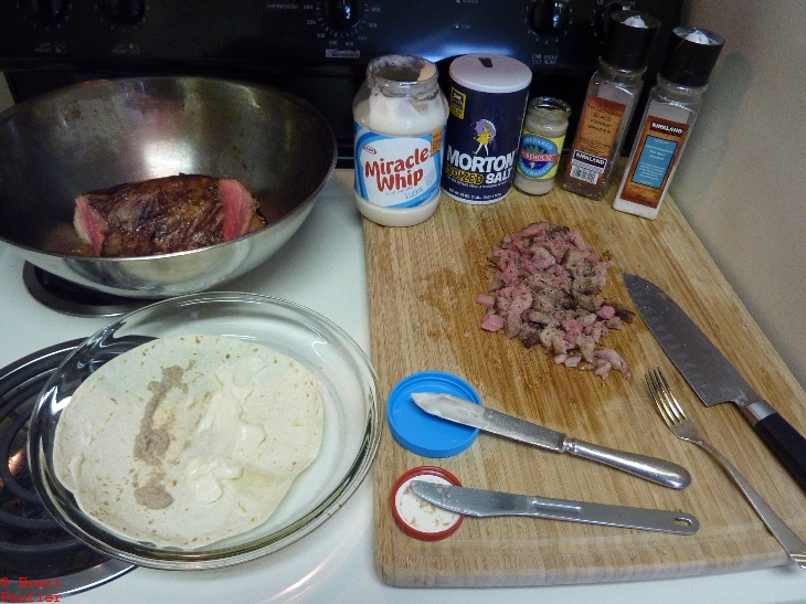 Mayonaise and Horseradish Burrito, sort of like a roast beef sandwich, sort of, this is just the ingredients all laid out on a small crappy stove top, really crappy stove top, but it is what I cooked on for two or three years