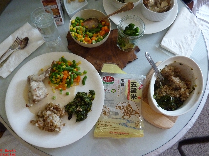 plate on table, lots of dishes set about, some packet of mushrooms it looks like, leftover jar of broccoli, just a standard dinner, back in the day