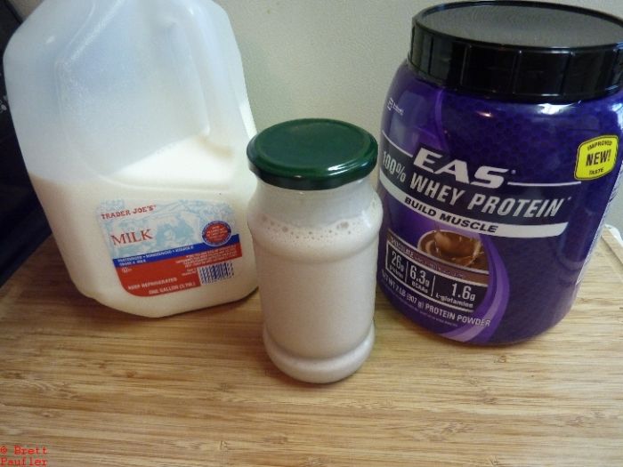 milk, cheap protien shake, shaken in a glass jar, therebe the trick