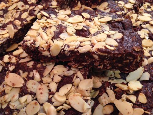 Brownies, a standard recipe, with canned cherries and oatmeal added, and sliced almonds pressed into the top, very tasty, oh, lots of salt, too, the salt is as important as anything else, and does not really show up in a picture like this