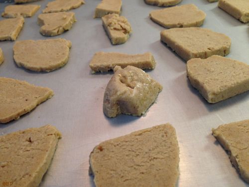 Frozen Ginger Cookie Dough sliced and laid out on cookie sheet