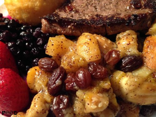 from bottom right, apricot stuffing, frozen strawberrie and blueberries, potatoe cheese hush puppy, steak