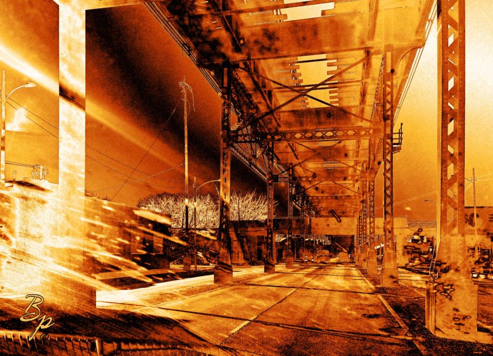 Same Gold Filter, we are underneath the L in Chicago, far suburbs, the road travels underneath, and above and to the side run the steel girder supports, the image was taken from within a travelling car, and much of the distortion is do to dirty on the windshield, the remained from the glaring angle of the sun