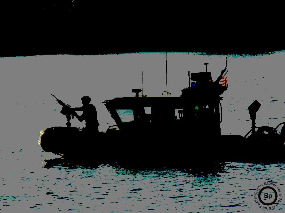 ah, now this is a nice picture, half of me wants to save it, the other says, use it and more will come, it is of a gunship in the harbor, little pt liferaft thing, with a fifty caliber maching gun on the prow, nothing says the pursuit of happiness like a fifty caliber smoking in the morning