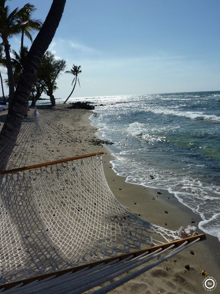 two images of the same beach, one with hammock