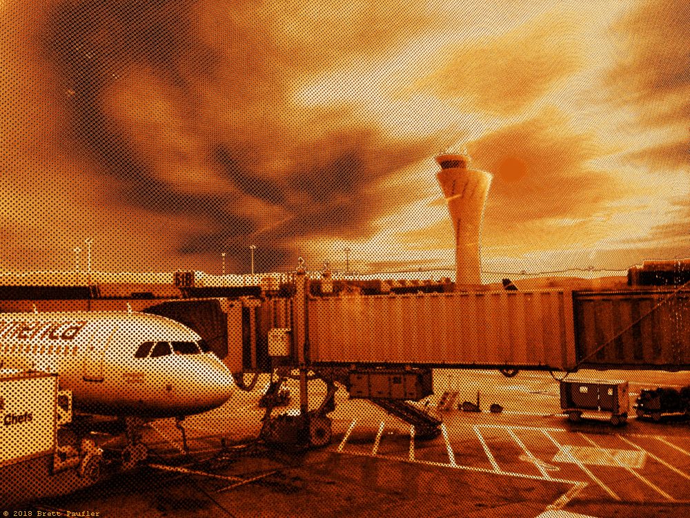 Recently, spent some time wandering around the city, shall I tell you of the journey, the things I saw, the trip I made, this is an image taken at the airport of a plane at the boarding gate, I like the shot, it would have stood alone, and then, I put it through a gold filter, all the images on this page have been put through a gold filter, at which point the pictures came alive, told a story, oh, and the clouds look pretty nifty, as the tonal variations come through better