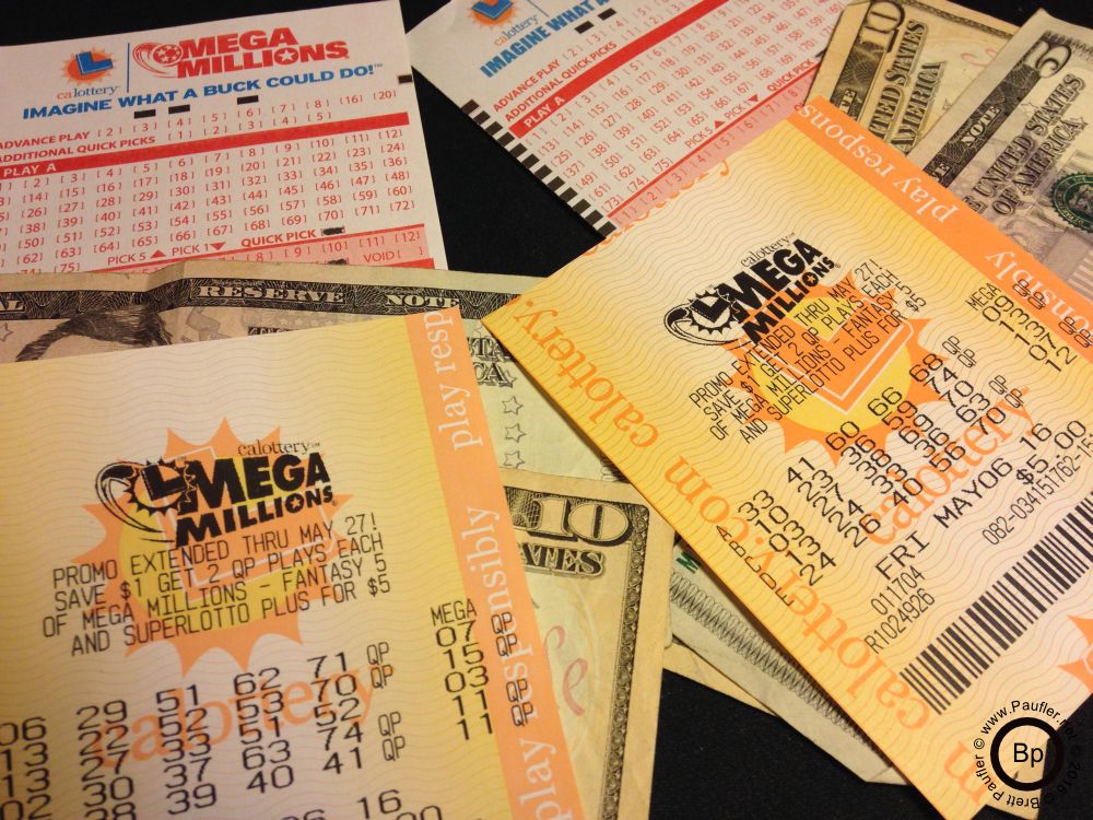 ten dollars in California Lottery Mega Millions play tickets, two selector play slip, and thirty dollars cash