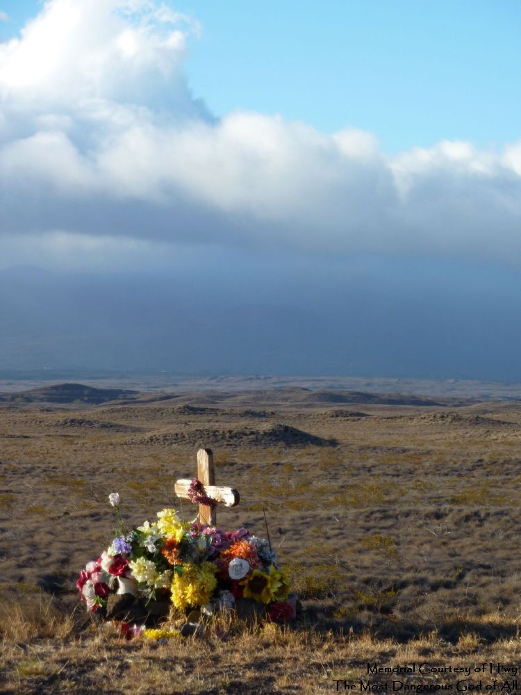 H'wy A roadside memorial, which I take to be to the God H'wy, opinions on this will differ, and I am sure the original participants had other(s) in mind, flowers, cross, rolling hills, and a blue sky, a nice view for the here-after