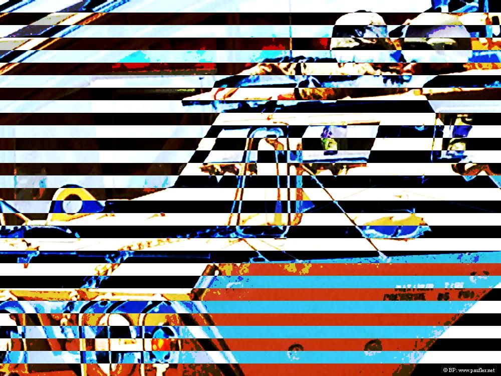 This has stripes on it, white, black, and a hint of technicolor, gives it a Andy Warhol feel about it to me, but it would be too hard to decipher without the clues provided in the matching image