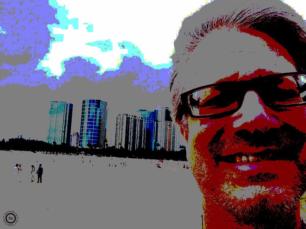 Waikiki Beach Hawaii on the island of Ohau, the image, of course, has precious little to do with the text that follows, raw picture put through a posterize filter