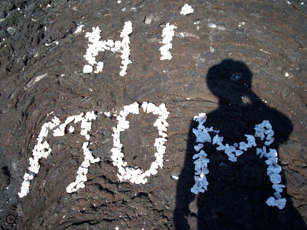 This is from the Big Island, up the coast from Kona, white coral is arranged on the black lava, making pretty pictures, you know, graffiti of sorts