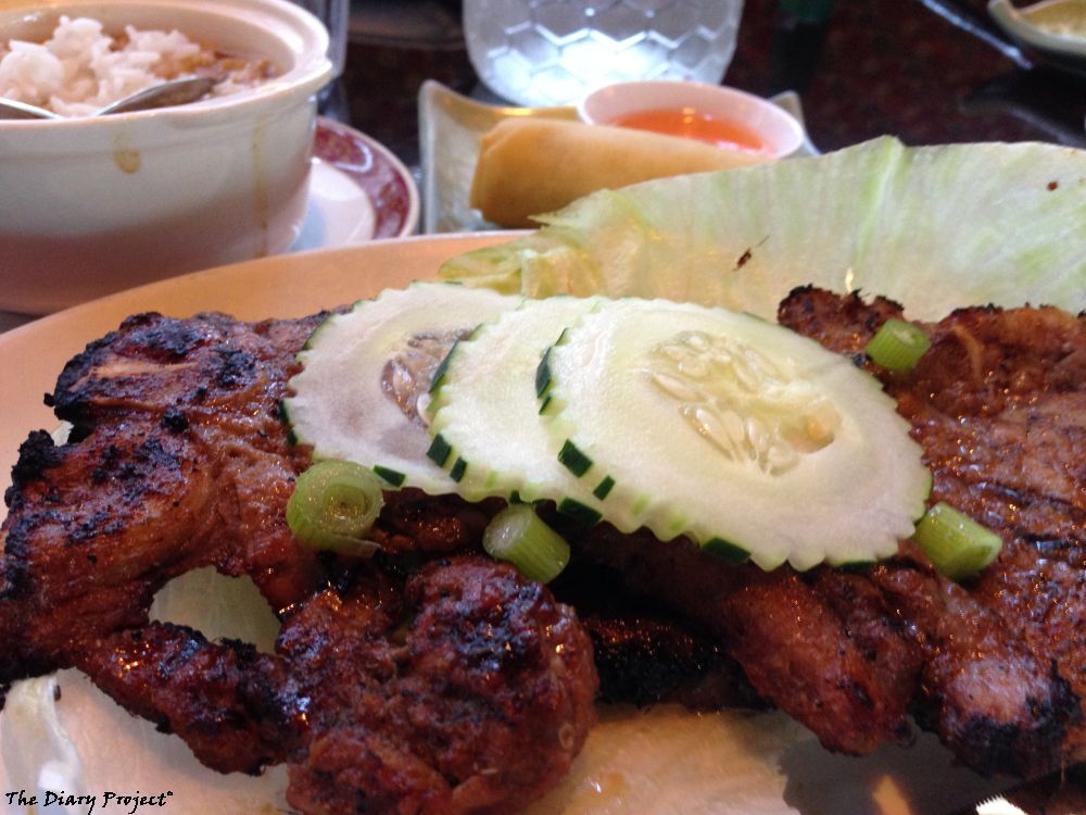 Braised marinated pork chops with cucumbers hot sour soup and spring roll, a nicely elegant lunch special, that tastes great