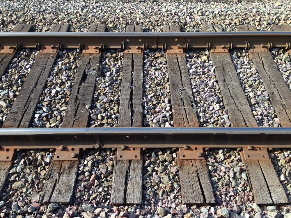 Railroad tracks, nothing much beyond that, I must have posted a few dozen, half dozen, at least two or three other images very similiar to this one on the site, I find them soothing, close up of railroad tracks, that is what it is
