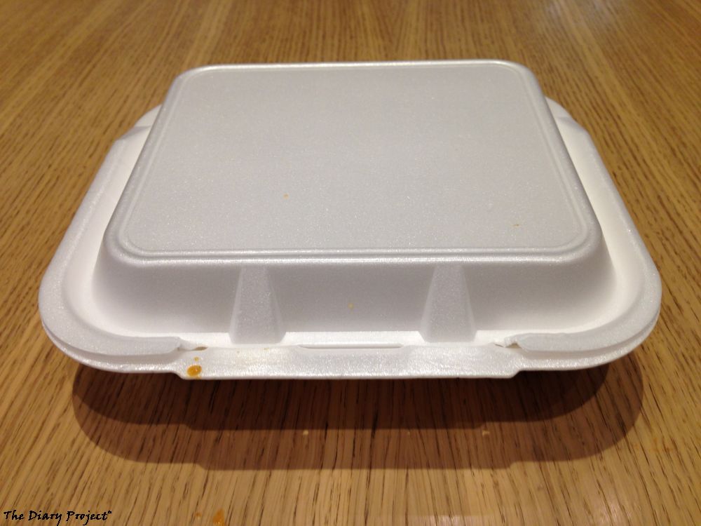 A styrofoam box lunch container, could contain anything, contained Thai food in this case, I do believe I will concentrate more on ambiance from now on, and this was the ambiance of this meal