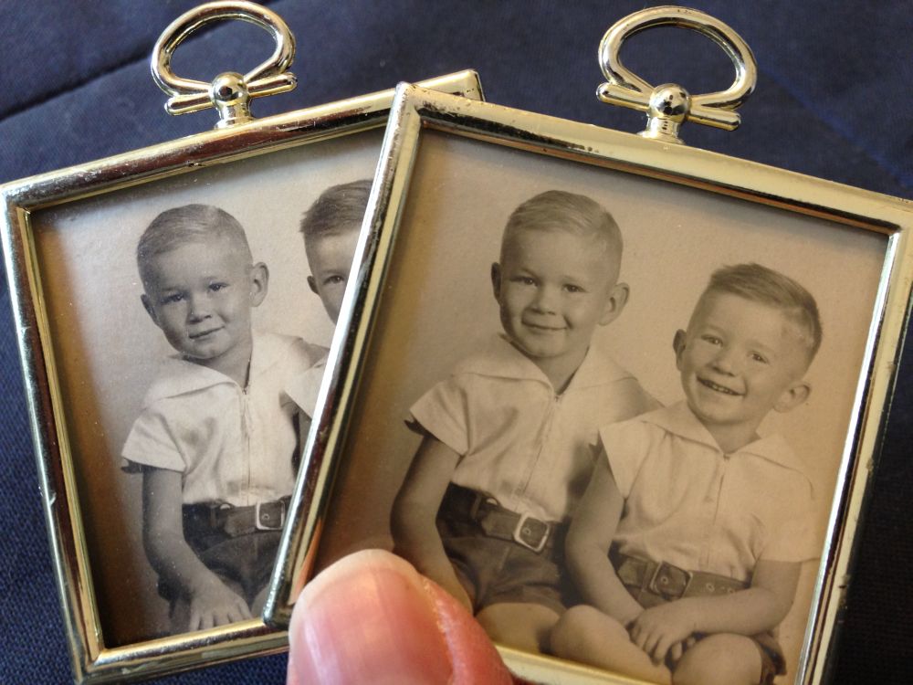 double side by side pictures in keepsake frames of my father and his brother or so I presume, could really be anybody, youngish in age, three or four, something like that, black and white