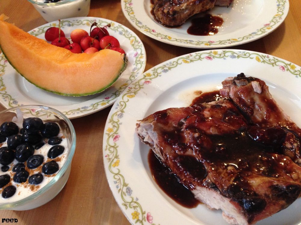 ribs, fresh fruit, blueberries and yogurt, it was a good meal
