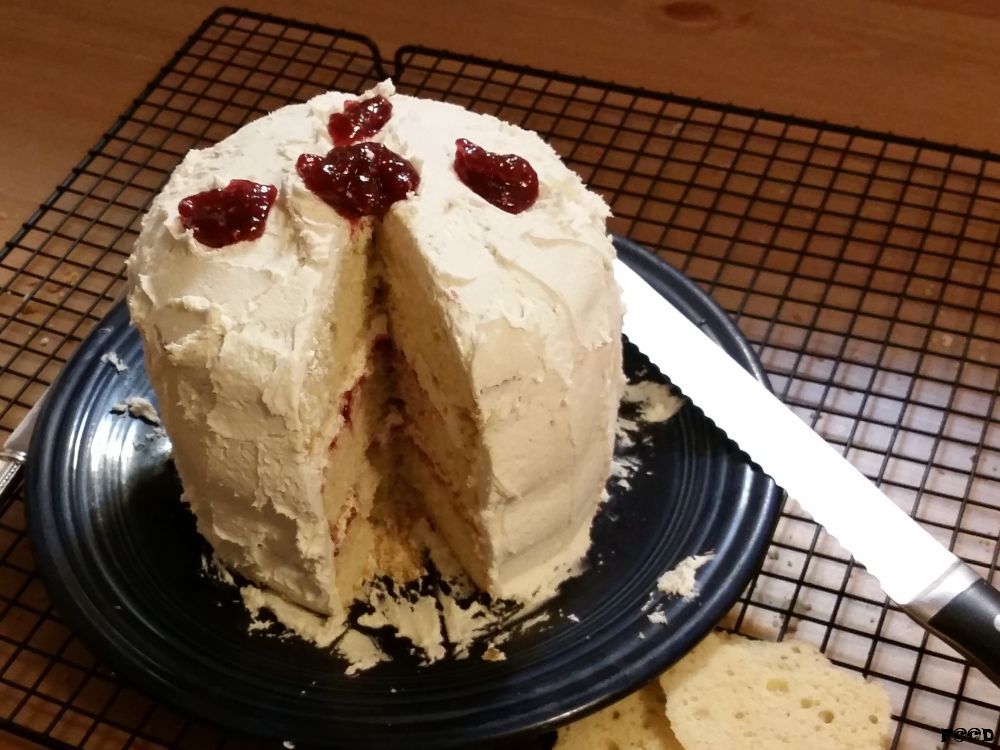 This one I made, a vanilla white cake with butter cream frosting and strawberry jam, with a little more frosting, and extra frosting