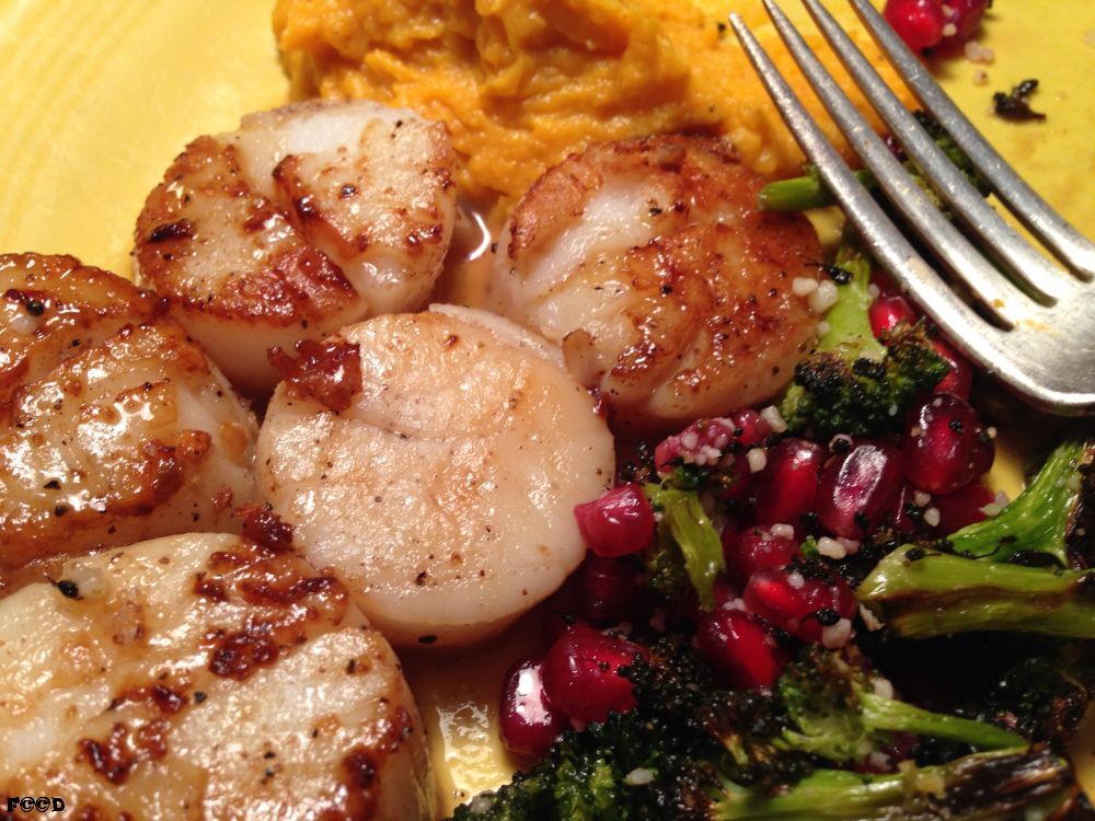 Delightful, scallops, broccoli with pomegranite seeds and parmesian cheese