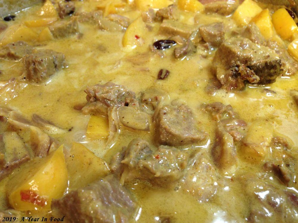 Lamb and Potatoes in a Curry sauce, golden delicious