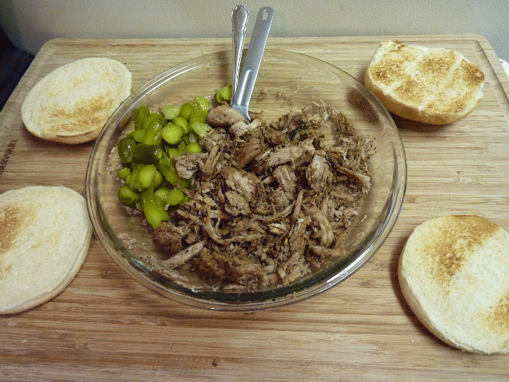 pork, shallots, pickles, lots of balsamic vinegar, loaded together on a bun, eat over the sink or a pie plate as shown, and delicious, unless you are some futuristic robot, in which case, stay away, this stuff with clog your circuits and rot your bits