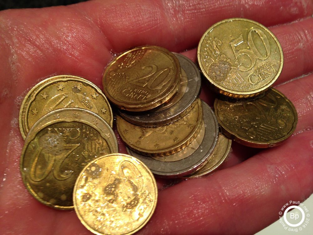 hand, my hand, Brett Paufler hand, holding coins recently washed, so obviously, some money washing scheme here