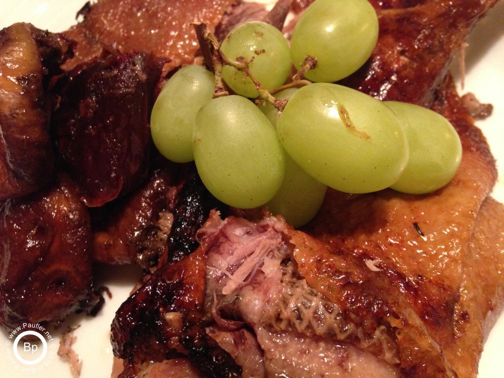 Looks like duck, figs, and dates, one of the best meals, photo does not look so great