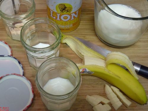 I suppose the only ingredient that really matters is the Lion brand custard mix, think it was corn starch, maybe a special type, also have a measuring cup of milk shown, banana, knife on cutting board, and a bunch of those jelly jars, forget the brand name, shown here and there, great jelly, great jars