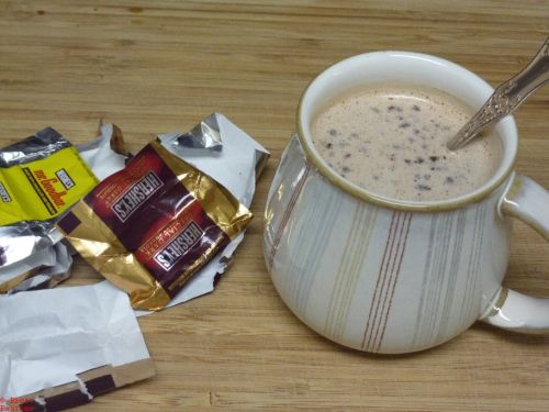 The finished product, hot chocolate made out of melted snack size chocolate bars like the kind one gets for Halloween... or gives away, I suppose it depends upon the age of the child involved.