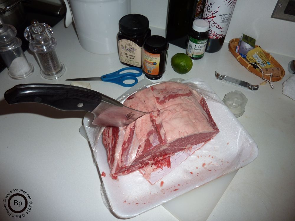 meat with knife jutting out of it