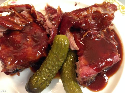 Cooked ribs, 250 degrees through and through for hours on end, with BBQ sauce and pickles, the pickles really add to the experience, I would throw more on there next time
