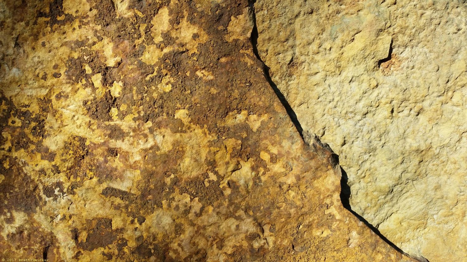 Opposite stonehenge in the walk, there was a lone rock monolith, this is from the backside where the sun was shining, I like the close up of the rock, the brown lichen, and the crack