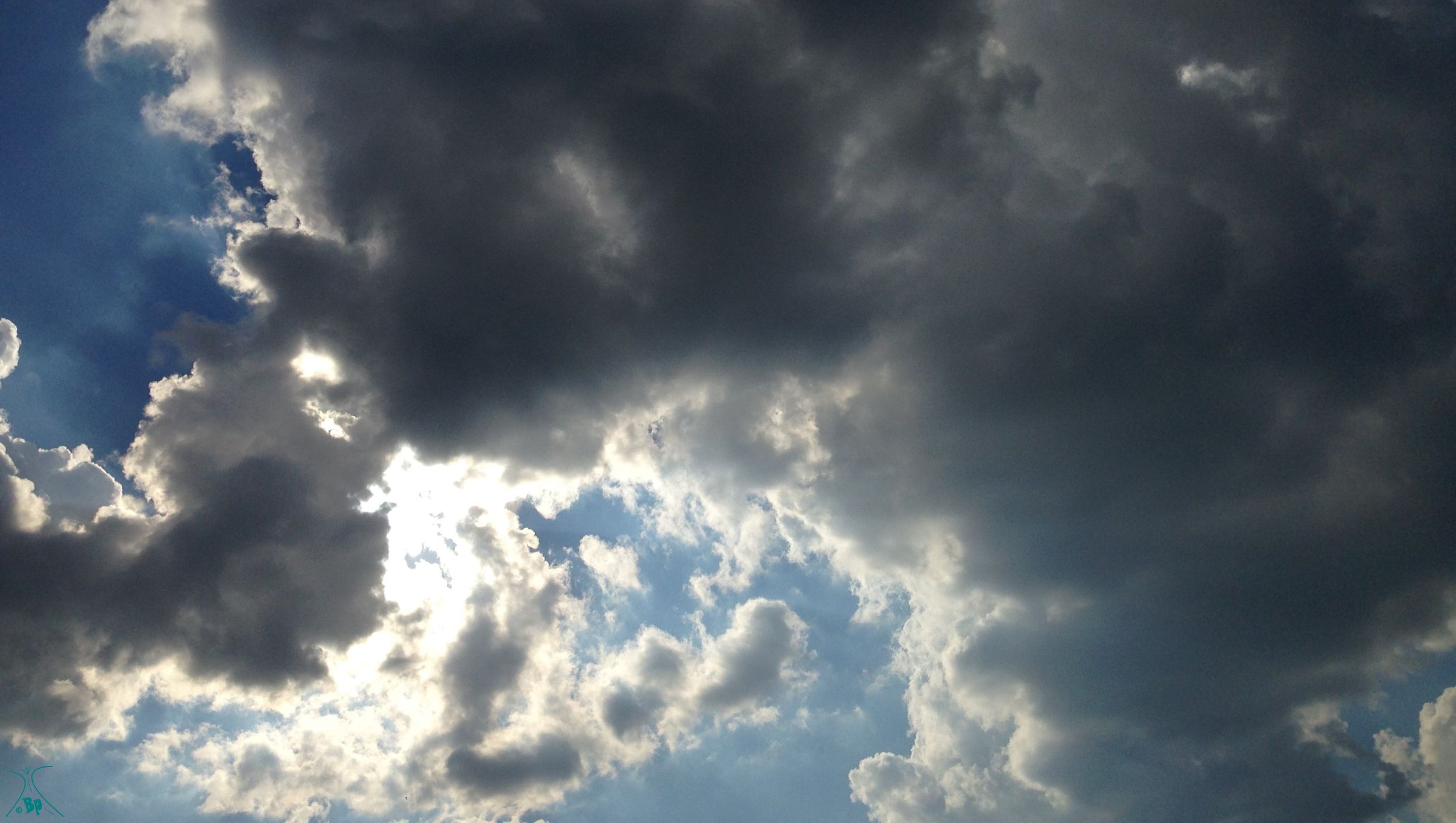 A simple picture of clouds... or if you prefer, the sun hiding behind a bank of clouds, nice, soothing