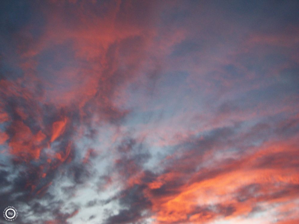 Clouds at sunset, turning colors, all pretty like, often regarded as one of the nicest times of day, of the many images of sunsets I have taken, this is one of the best