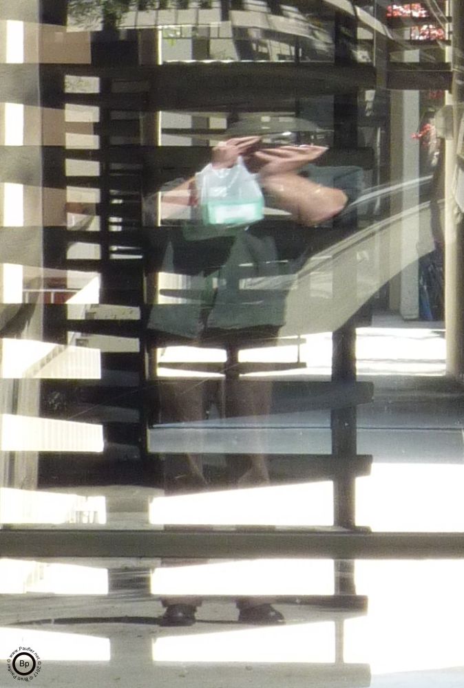 I did mirror work for a while, along with shadow work below, this is a distorted reflection of me taking a photograph of myself in some store window