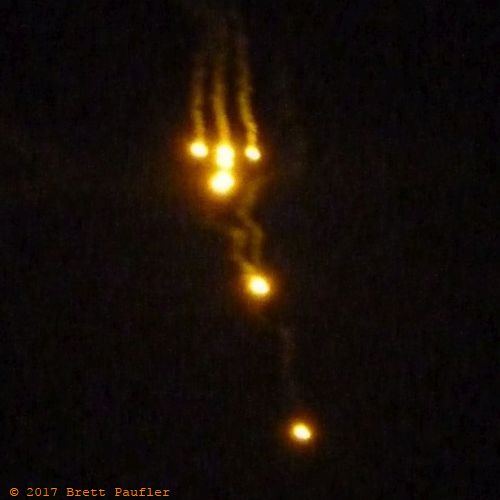 The Big Island, circa 2012, floating lights in the sky, pulled over, and after examination, the cause appeared to be military manuevers, of course, flares causes by military manuvers... or military manuevers caused by flare like activity in the night sky, and then, it is easy enough to shoot a few flares up into the sky after the real action is over and say, look, flares, so believe what you want