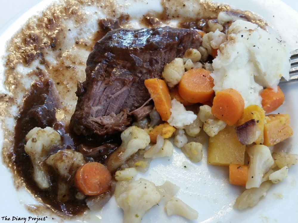Beef stew, boiled vegetables, and mashed potatoes, served cafeteria style, as if cooked in a cafeteria, with old style cafeteria prizing, expected little, got more
