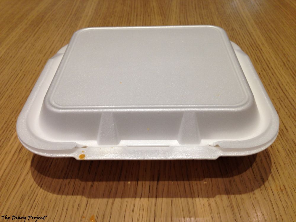 A styrofoam box lunch container, could contain anything, contained Thai food in this case, I do believe I will concentrate more on ambiance from now on, and this was the ambiance of this meal