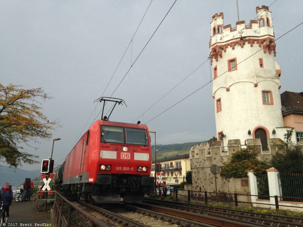 Red train half fills the shot, so it is a set of three